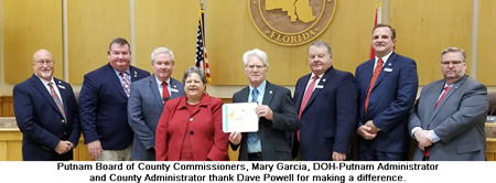 Putnam Board of County Commissioners, Mary Garcia, DOH-Putnam Administrator and County Administrator thank Dave Powell for making a difference.