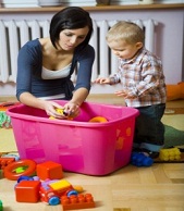A mother and child playing with toys together